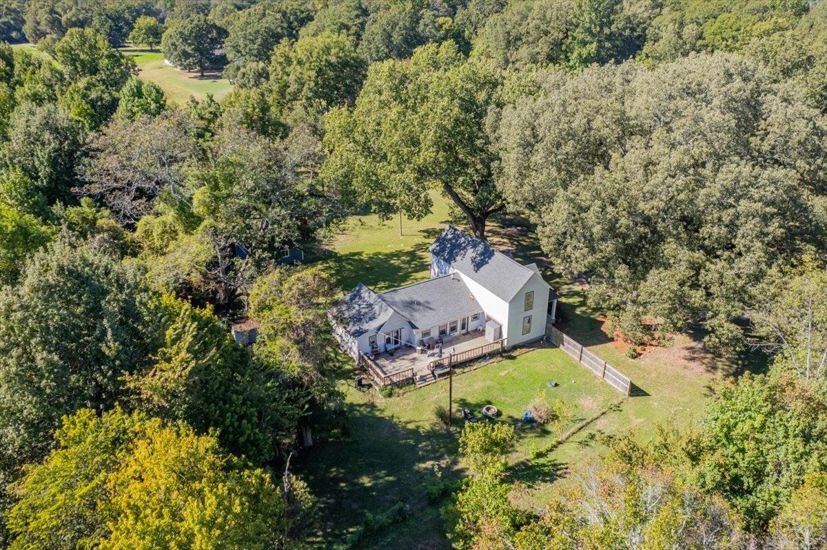 9301 Osborn Road Arlington, TN 38002 - Photo 30 of 31 an aerial view of a house with a yard lake and mountain view