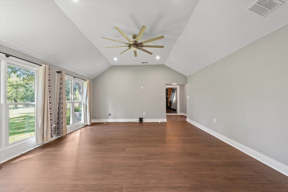 9301 Osborn Road Arlington, TN 38002 - Photo 8 of 31 wooden floor in an empty room with a window