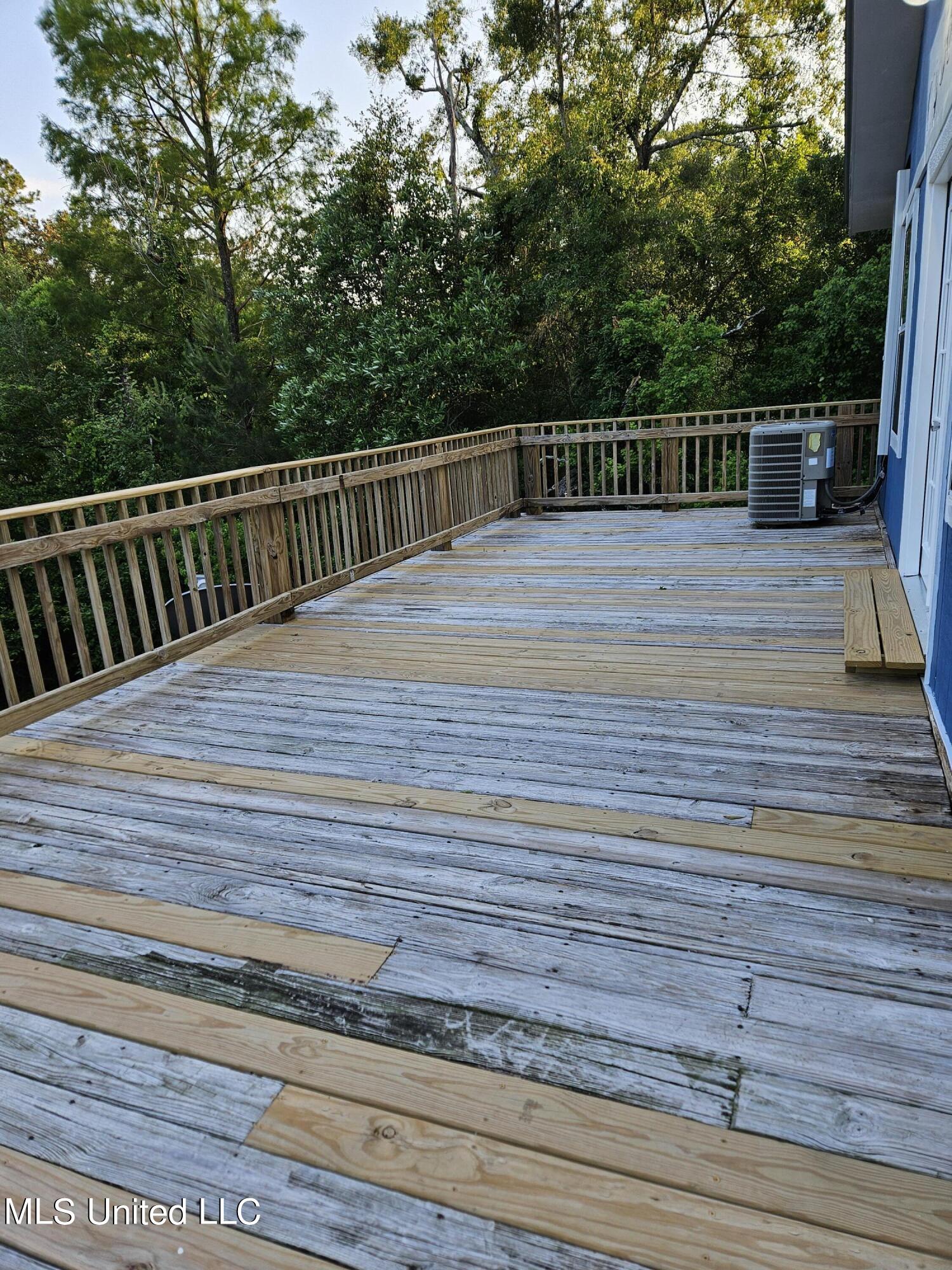 11279 South River Road Gulfport, MS 39503 - Photo 32 of 38 Exterior Front Deck v4