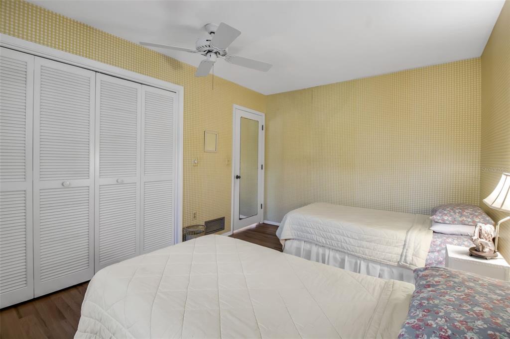 509 Spoonbill Way Sarasota, FL 34236 - Photo 38 of 86 a bedroom with a bed and a table