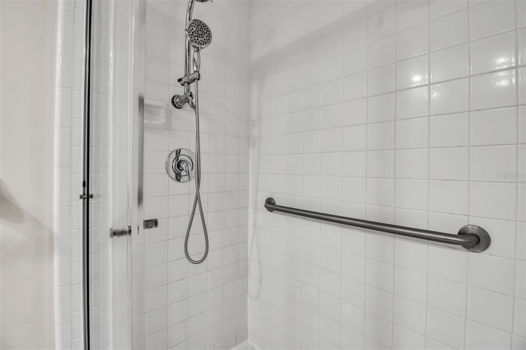509 Spoonbill Way Sarasota, FL 34236 - Photo 50 of 86 a bathroom has pair of shower