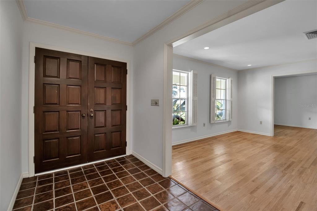 509 Spoonbill Way Sarasota, FL 34236 - Photo 5 of 86 a view of an empty room with closet and windows