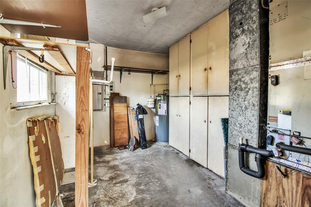 509 Spoonbill Way Sarasota, FL 34236 - Photo 59 of 86 a view of walk in closet with clothes