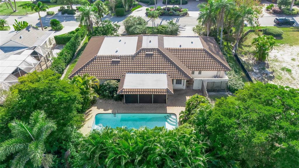 509 Spoonbill Way Sarasota, FL 34236 - Photo 65 of 86 an aerial view of a house with a yard and potted plants