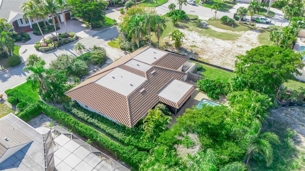 509 Spoonbill Way Sarasota, FL 34236 - Photo 73 of 86 an aerial view of a house with garden space and street view