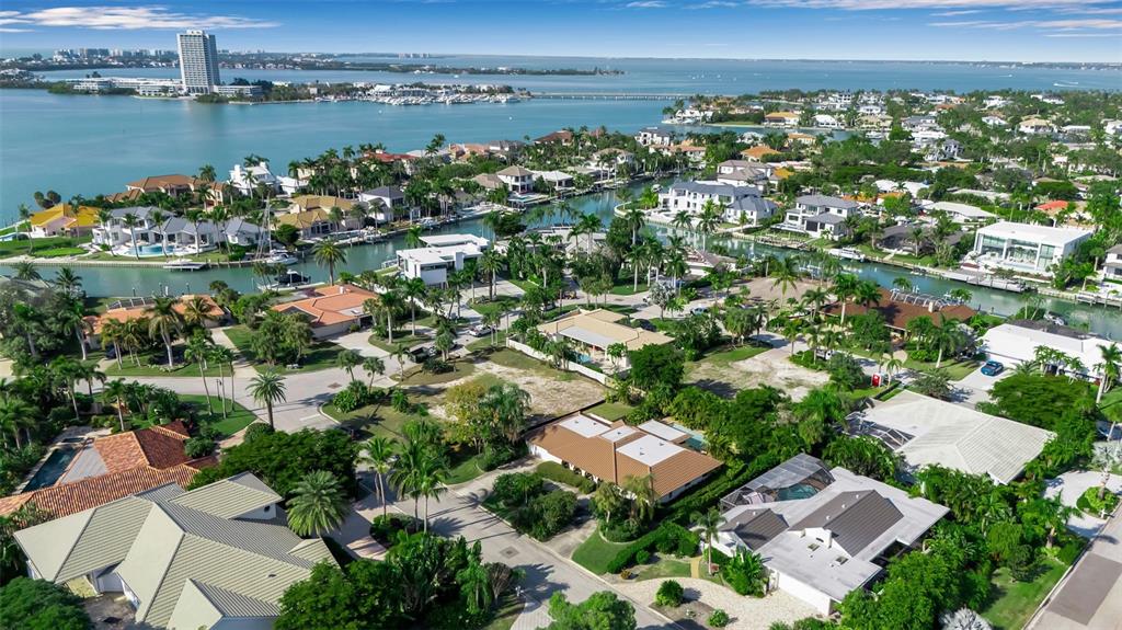 509 Spoonbill Way Sarasota, FL 34236 - Photo 75 of 86 an aerial view of a house with a lake view