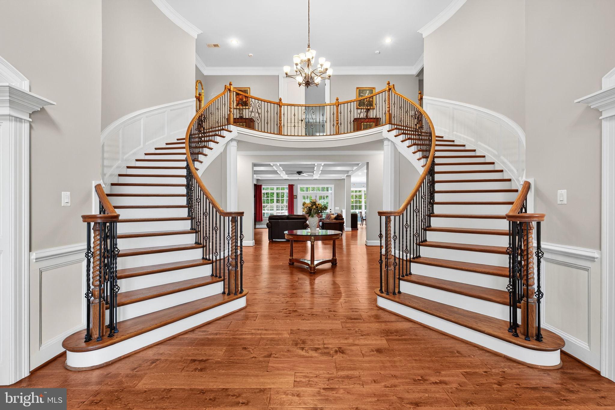 22011 Beaverdam Drive Ashburn, VA 20148 - Photo 13 of 106 a view of entryway and hall with wooden floor