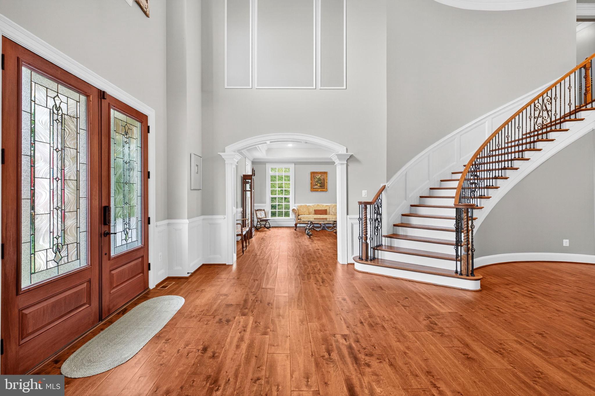 22011 Beaverdam Drive Ashburn, VA 20148 - Photo 16 of 106 Elegant foyer with grand staircase.