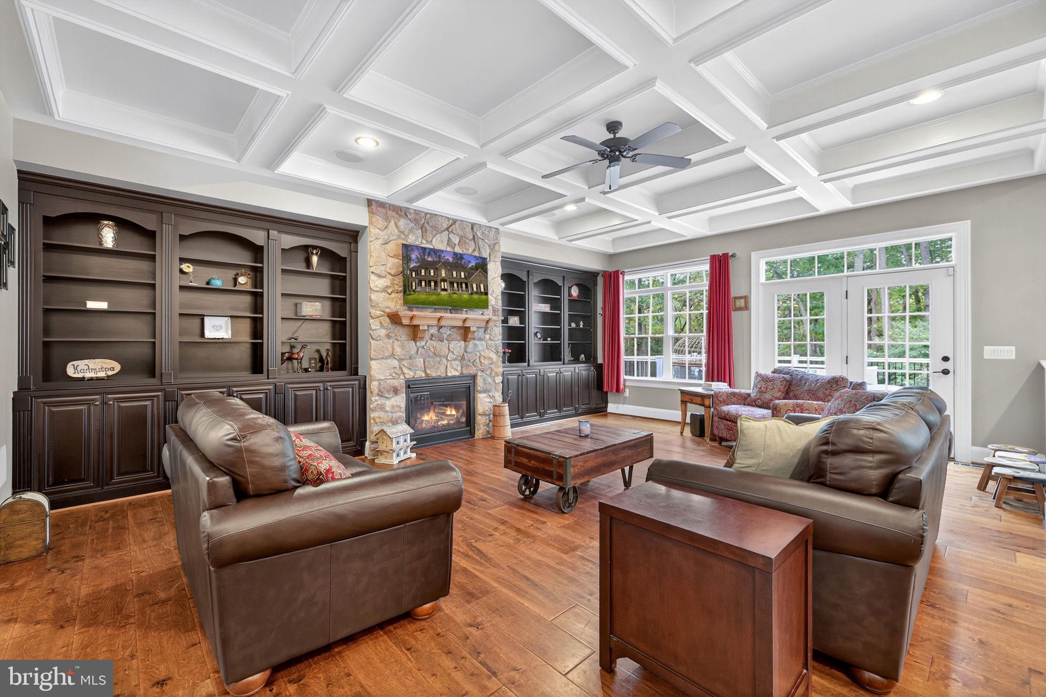 22011 Beaverdam Drive Ashburn, VA 20148 - Photo 22 of 106 a living room with furniture and a large window