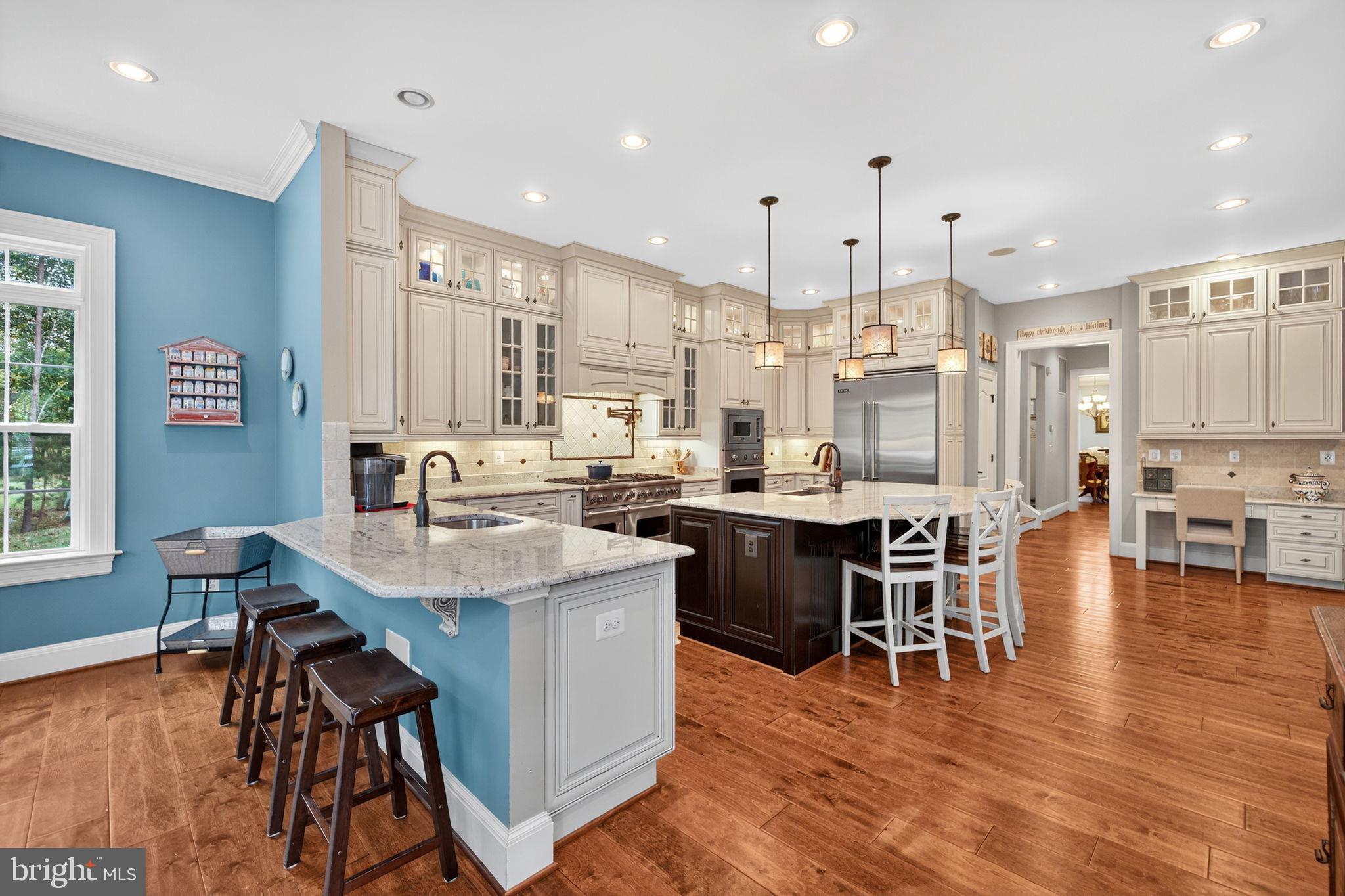 22011 Beaverdam Drive Ashburn, VA 20148 - Photo 37 of 106 Spacious kitchen with elegant cabinetry.