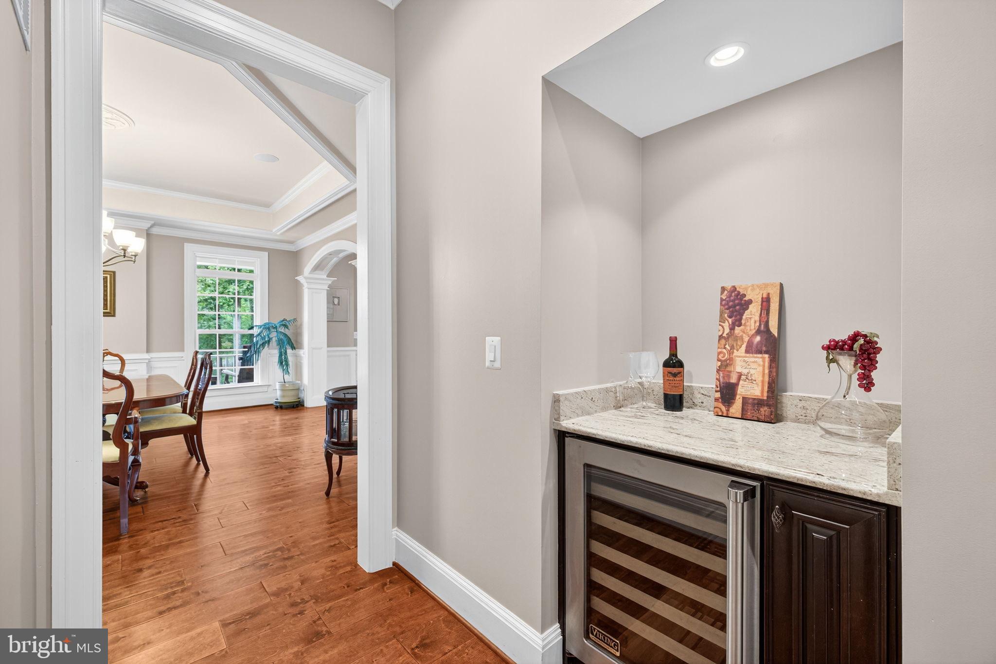 22011 Beaverdam Drive Ashburn, VA 20148 - Photo 50 of 106 Elegant entryway with wine storage nook.