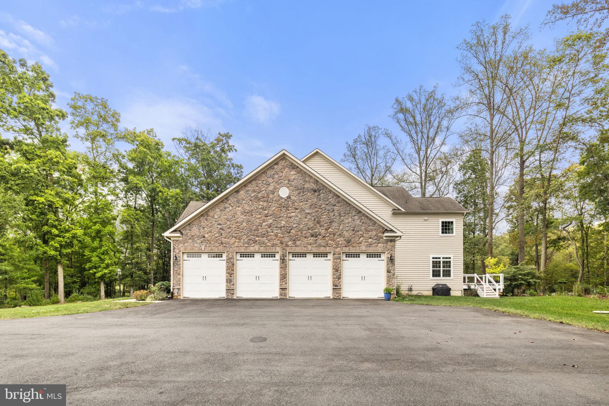 22011 Beaverdam Drive Ashburn, VA 20148 - Photo 6 of 109 Oversized, 4-car garage with extensive parking