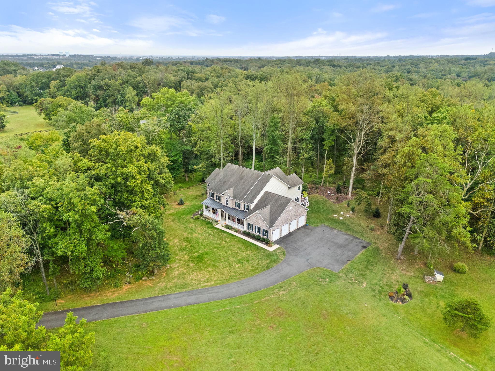 22011 Beaverdam Drive Ashburn, VA 20148 - Photo 6 of 106 a view of a yard with an outdoor space