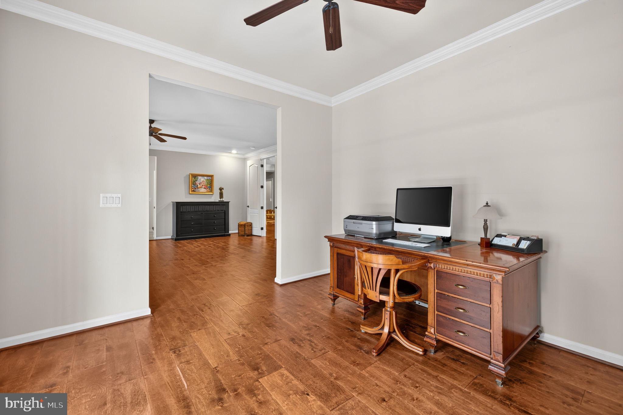 22011 Beaverdam Drive Ashburn, VA 20148 - Photo 66 of 109 Elegant workspace with warm wood floors.