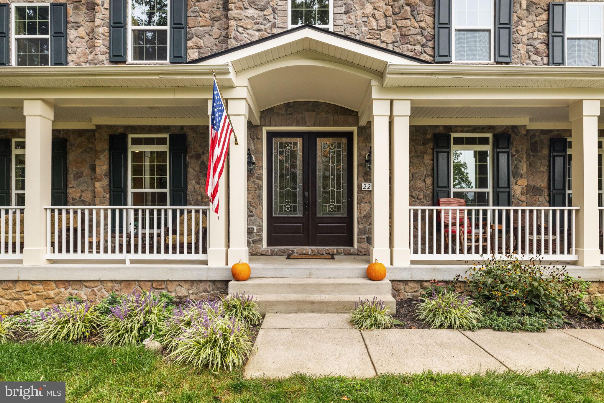 22011 Beaverdam Drive Ashburn, VA 20148 - Photo 7 of 109 Charming stone facade with autumn accents.
