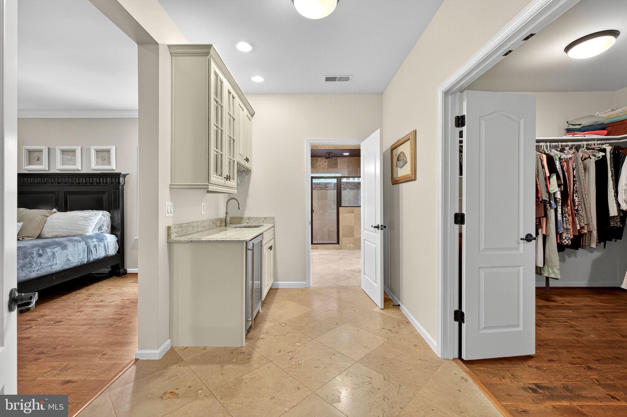 22011 Beaverdam Drive Ashburn, VA 20148 - Photo 71 of 109 Spacious hallway with elegant finishes.