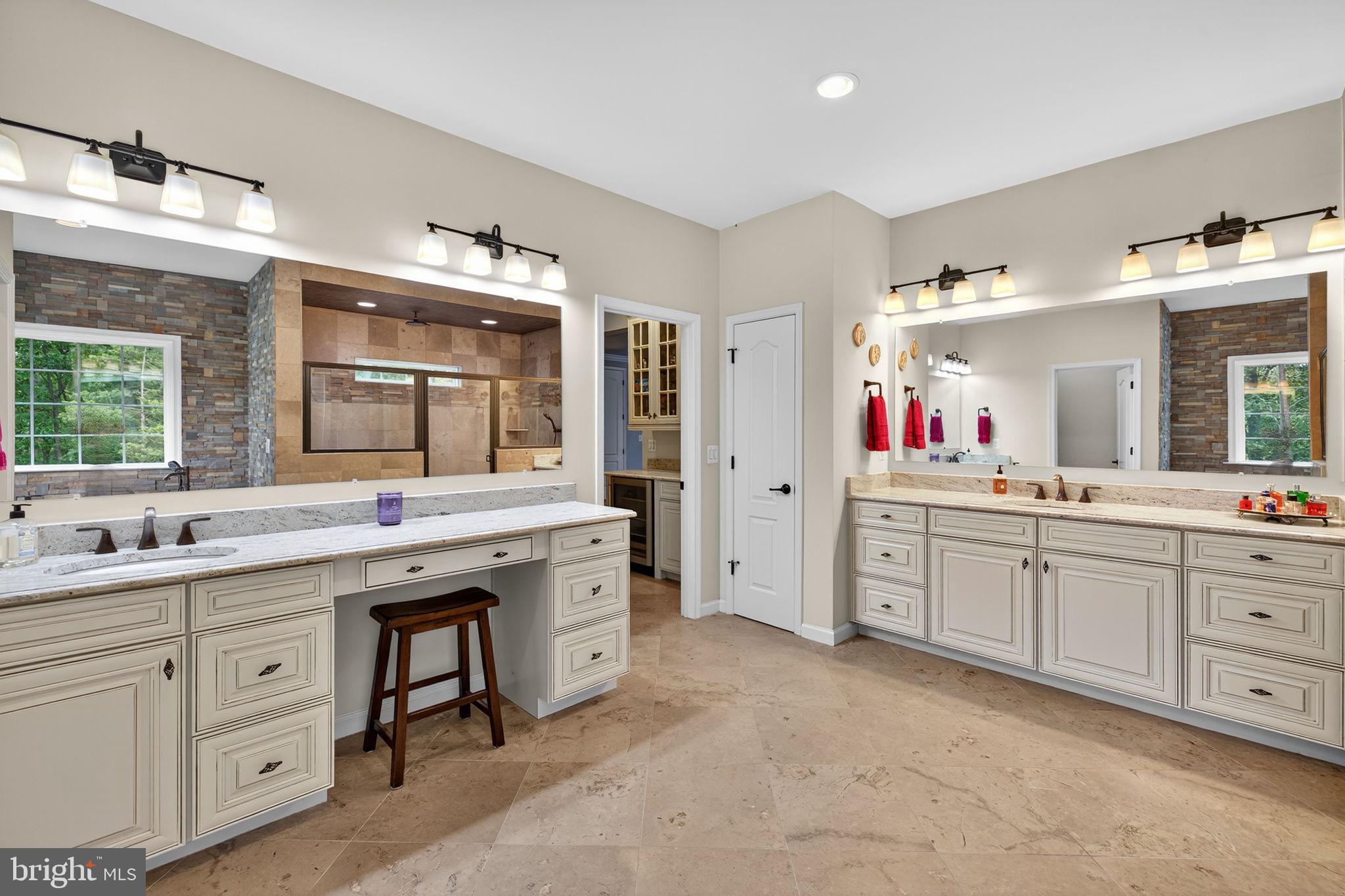22011 Beaverdam Drive Ashburn, VA 20148 - Photo 92 of 106 Spacious, elegant dual-sink bathroom retreat.