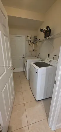 a view of a kitchen with a sink