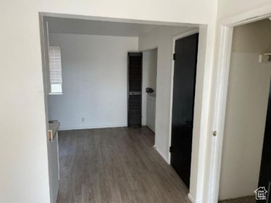 590 Pilot Avenue Wendover, UT 84083 - Photo 10 of 20 Corridor with wood finished floors and baseboards