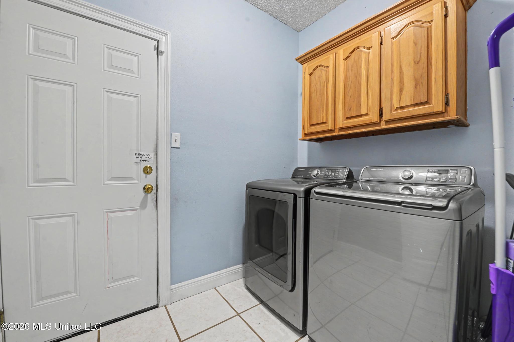 5715 Anoai Way Diamondhead, MS 39525 - Photo 21 of 24 Laundry Room