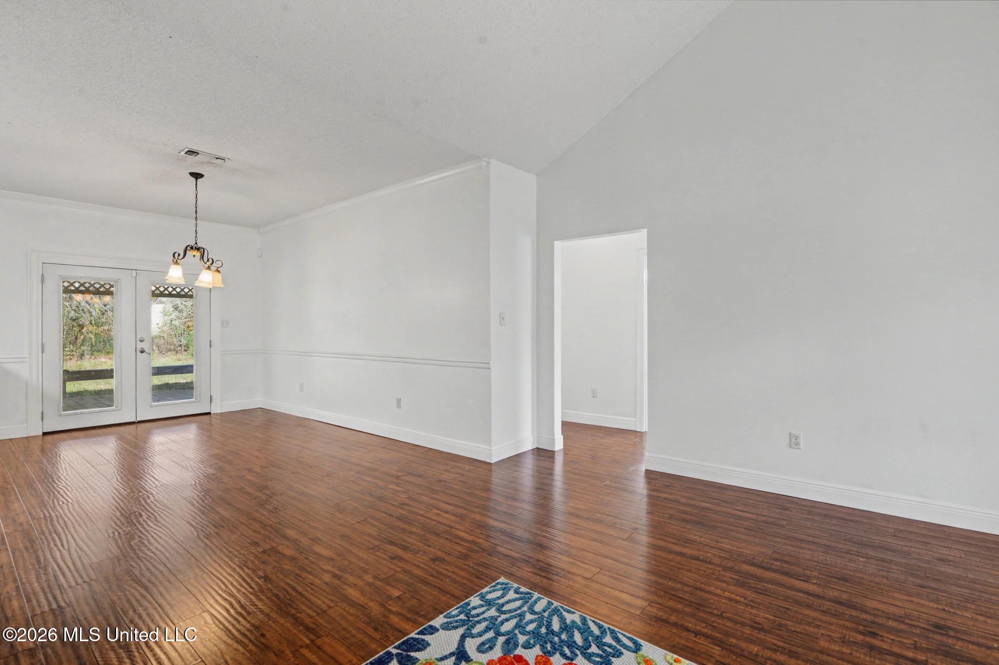 5715 Anoai Way Diamondhead, MS 39525 - Photo 6 of 24 Living Room to Breakfast Room