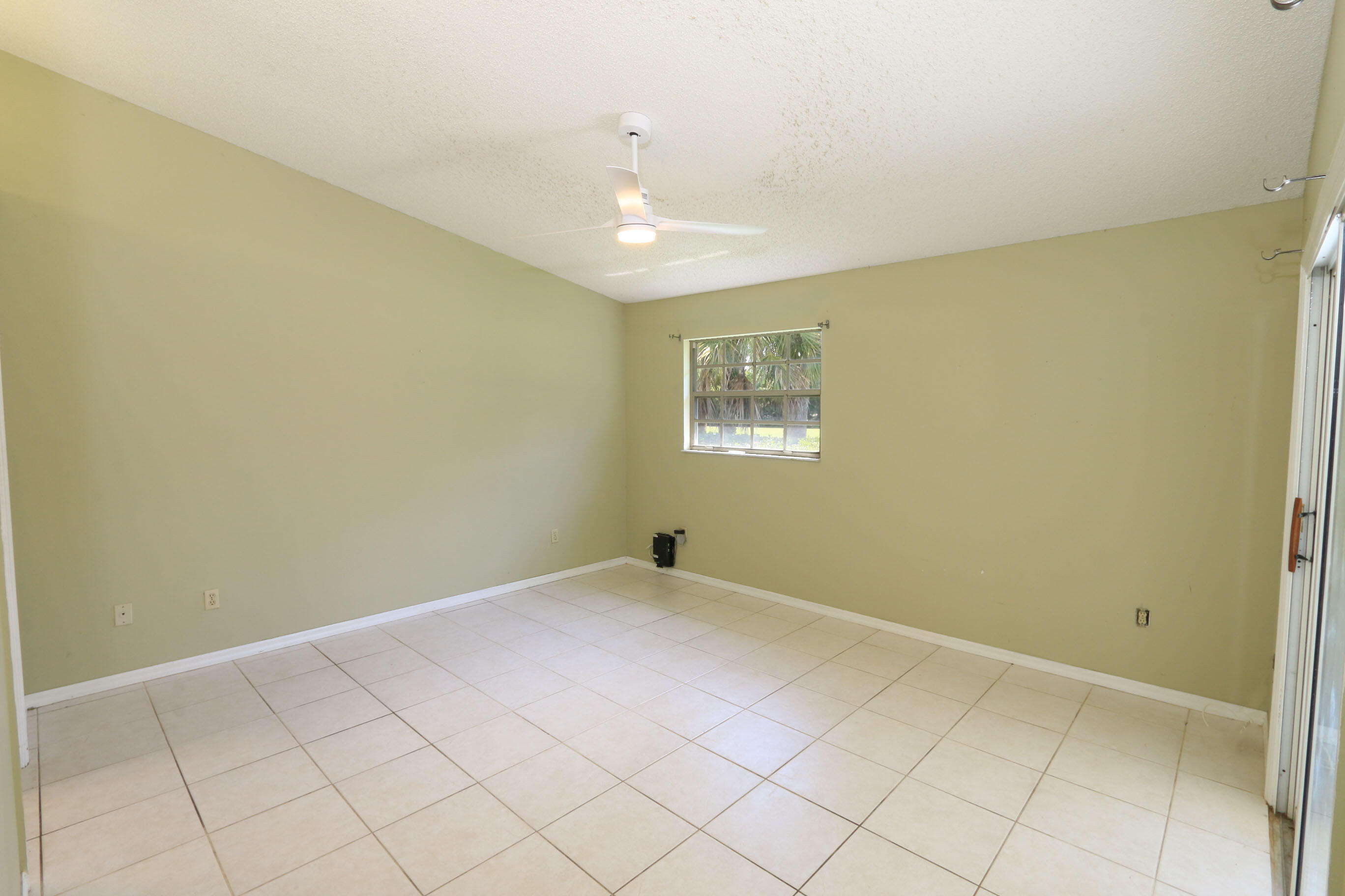 4074 Gator Trace Road Fort Pierce, FL 34982 - Photo 12 of 30 Primary Bedroom