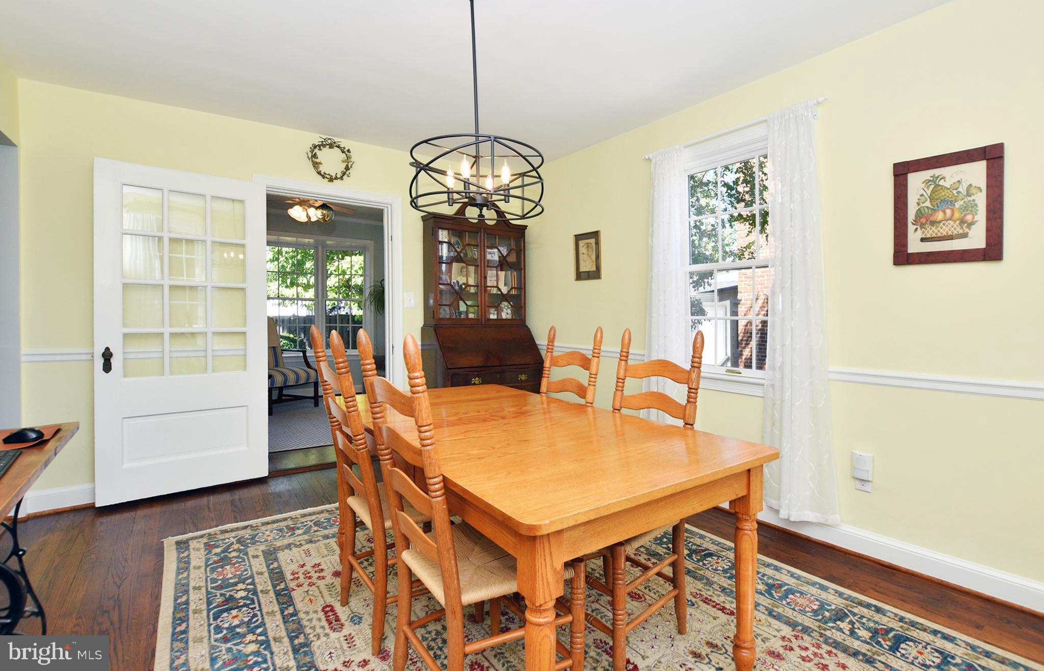 4515 Sleaford Road Bethesda, MD 20814 - Photo 19 of 47 Chair Rail Molding & New Chandelier in Dining Room