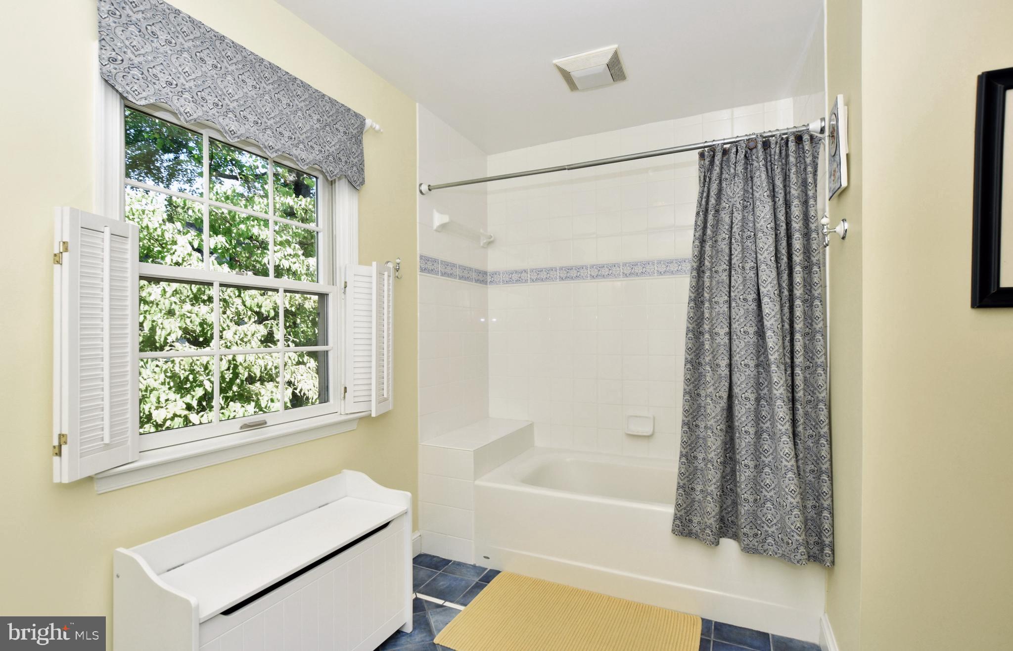4515 Sleaford Road Bethesda, MD 20814 - Photo 26 of 47 Tub/Shower with Ledge, Tile Floor & Window