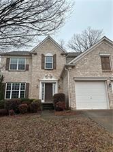 520 Hammersmith Drive Suwanee, GA 30024 - Photo 12 of 12 a front view of a house with a yard