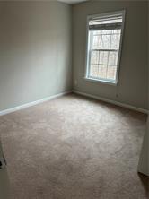 520 Hammersmith Drive Suwanee, GA 30024 - Photo 9 of 12 an empty room with a window