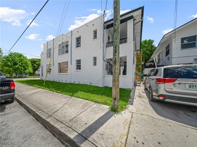 a car parked in front of a house