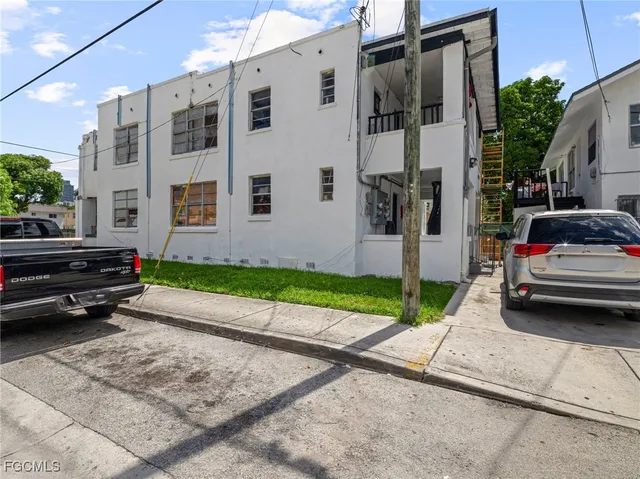 a car parked in front of a house