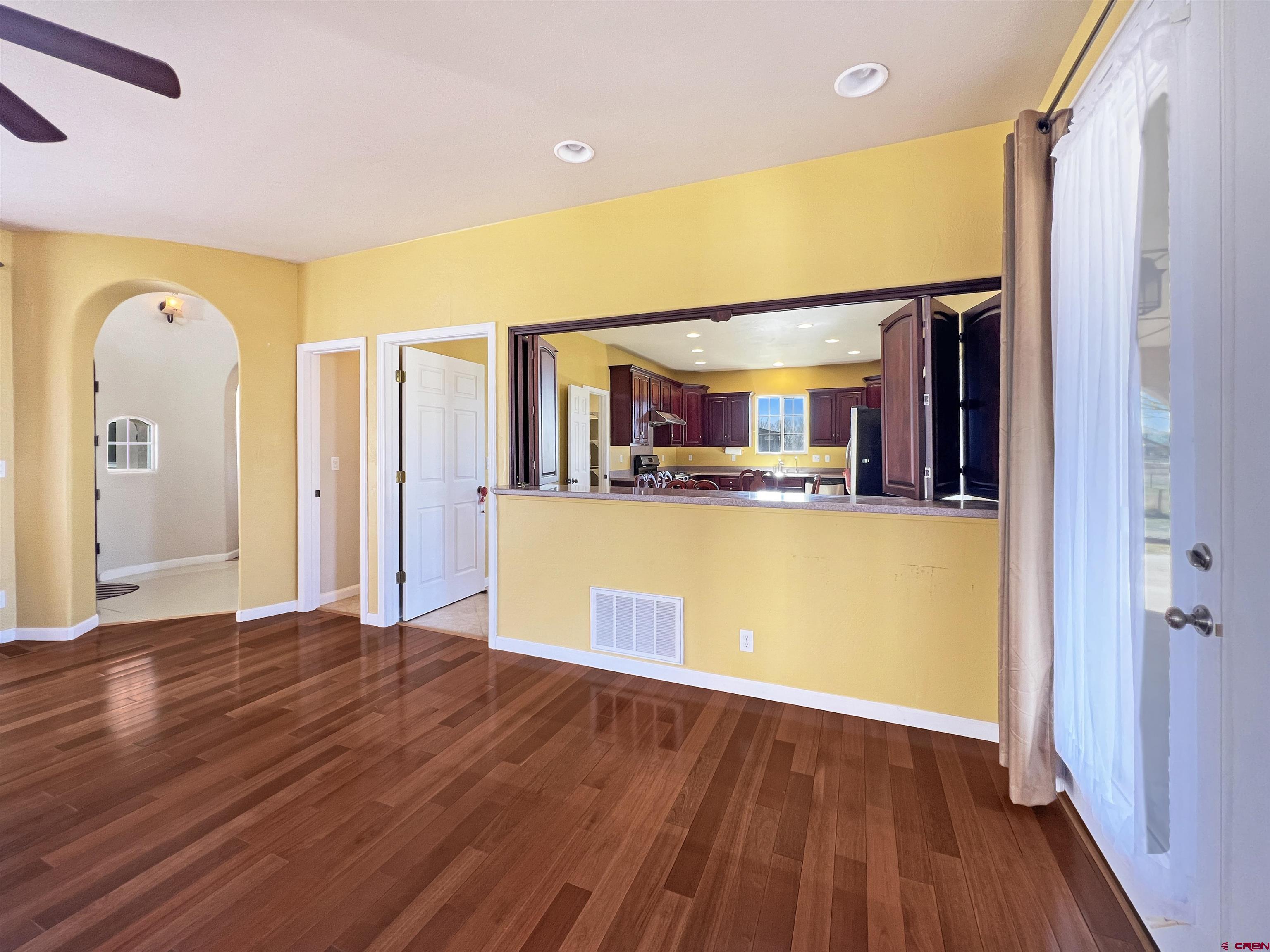 13723 Road 23 Cortez, CO 81321 - Photo 29 of 45 a view of a kitchen with a sink and cabinet with wooden floor