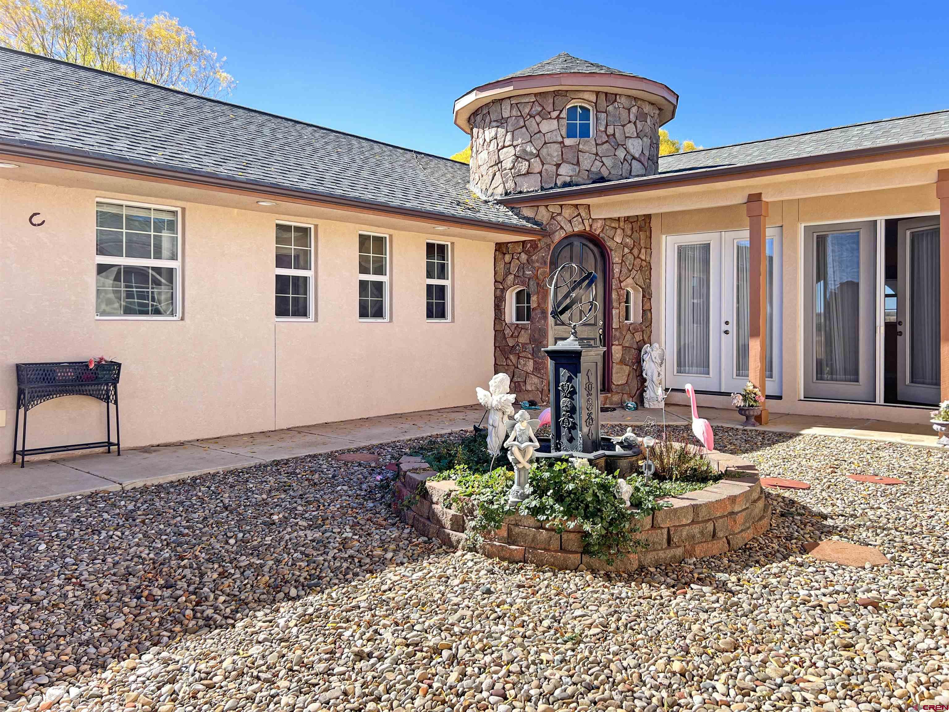 13723 Road 23 Cortez, CO 81321 - Photo 39 of 45 a front view of a house