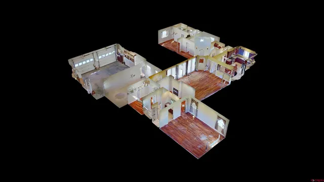 a view of a white house with a yard