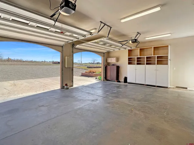 a picture of a bathroom with a shower