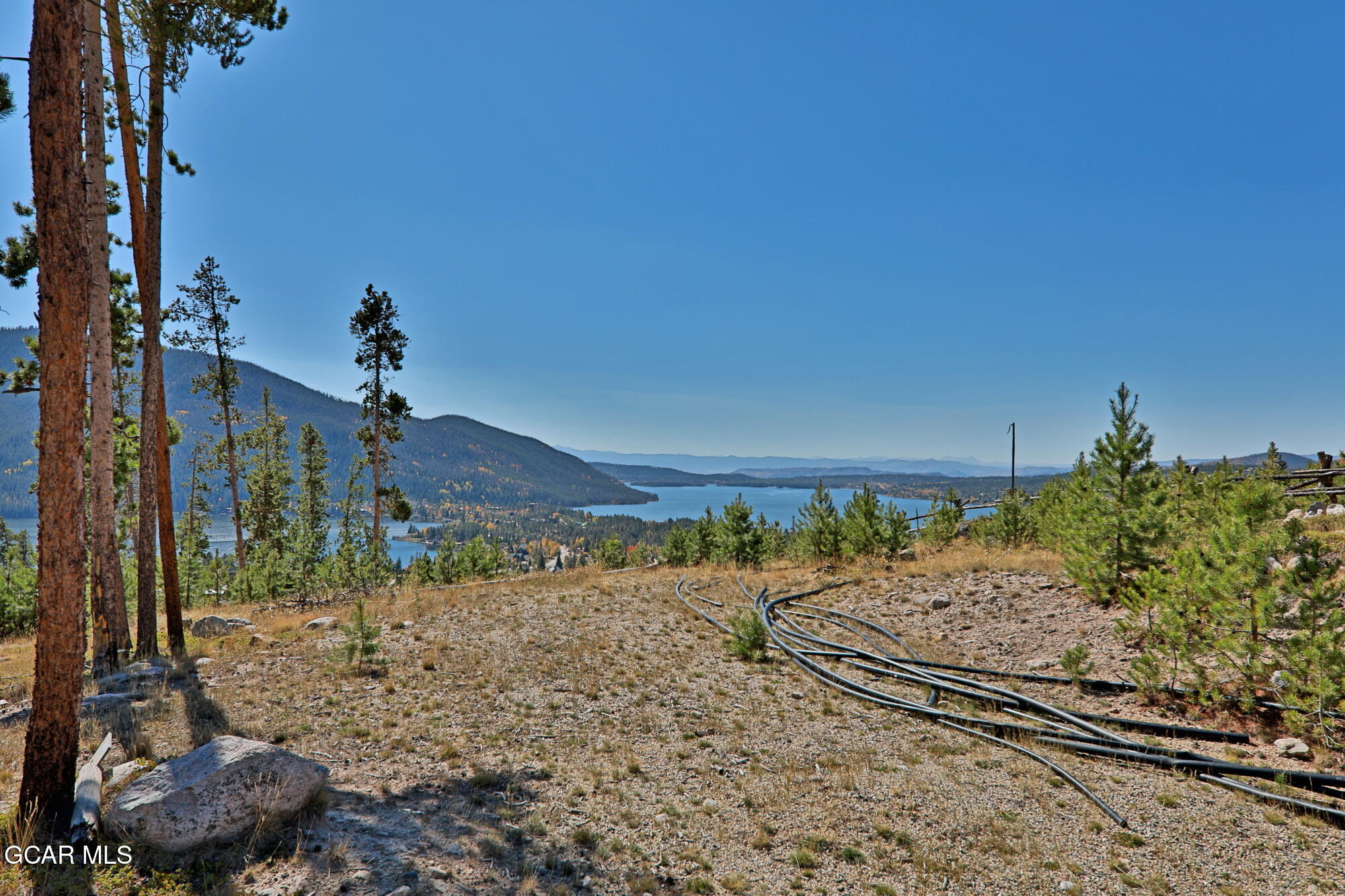 530 Old Tonahutu Ridge Road Grand Lake, CO 80447 - Photo 12 of 22 a view of a dry yard with wooden fence