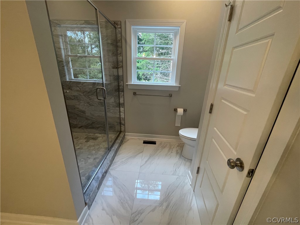 737 Rainbow Ridge Bumpass, VA 23024 - Photo 25 of 45 a bathroom with a sink and toilet