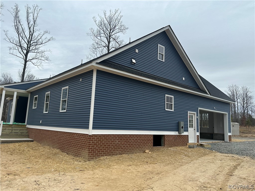 737 Rainbow Ridge Bumpass, VA 23024 - Photo 3 of 45 a front view of a house with a yard