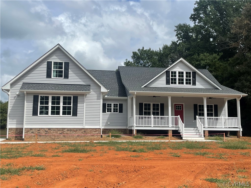 737 Rainbow Ridge Bumpass, VA 23024 - Photo 7 of 45 a front view of a house with a yard