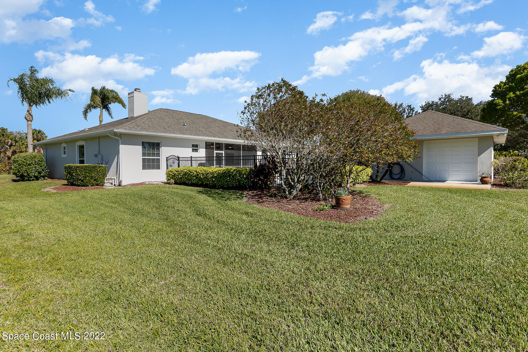 5562 Rising Star Lane Merritt Island, FL 32953 - Photo 22 of 25 West view of home