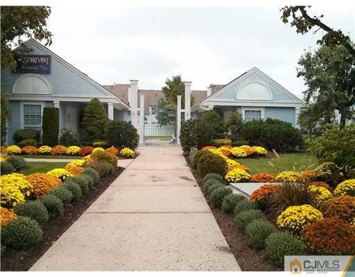 202 Nebula Road Piscataway, NJ 08854 - Photo 3 of 14 a view of a house with a yard and sitting area