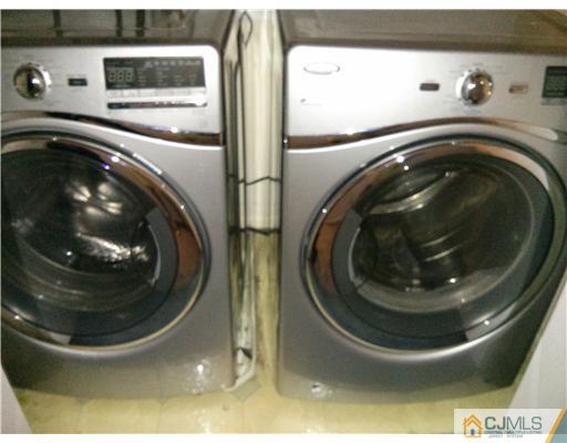 202 Nebula Road Piscataway, NJ 08854 - Photo 10 of 14 a utility room with a washer and dryer