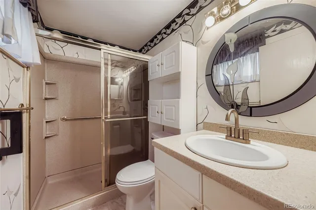 a bathroom with a sink and mirror