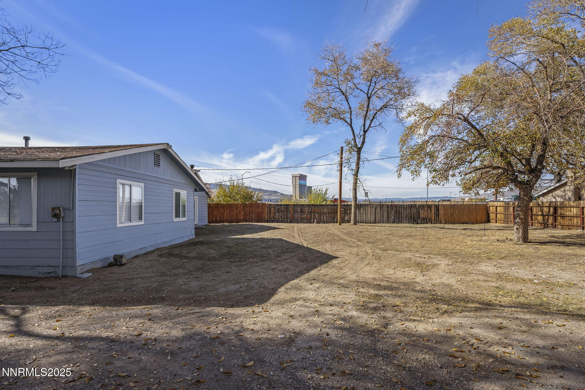 905 Mauldin Lane Reno, NV 89502 - Photo 16 of 21 a view of a house with a yard