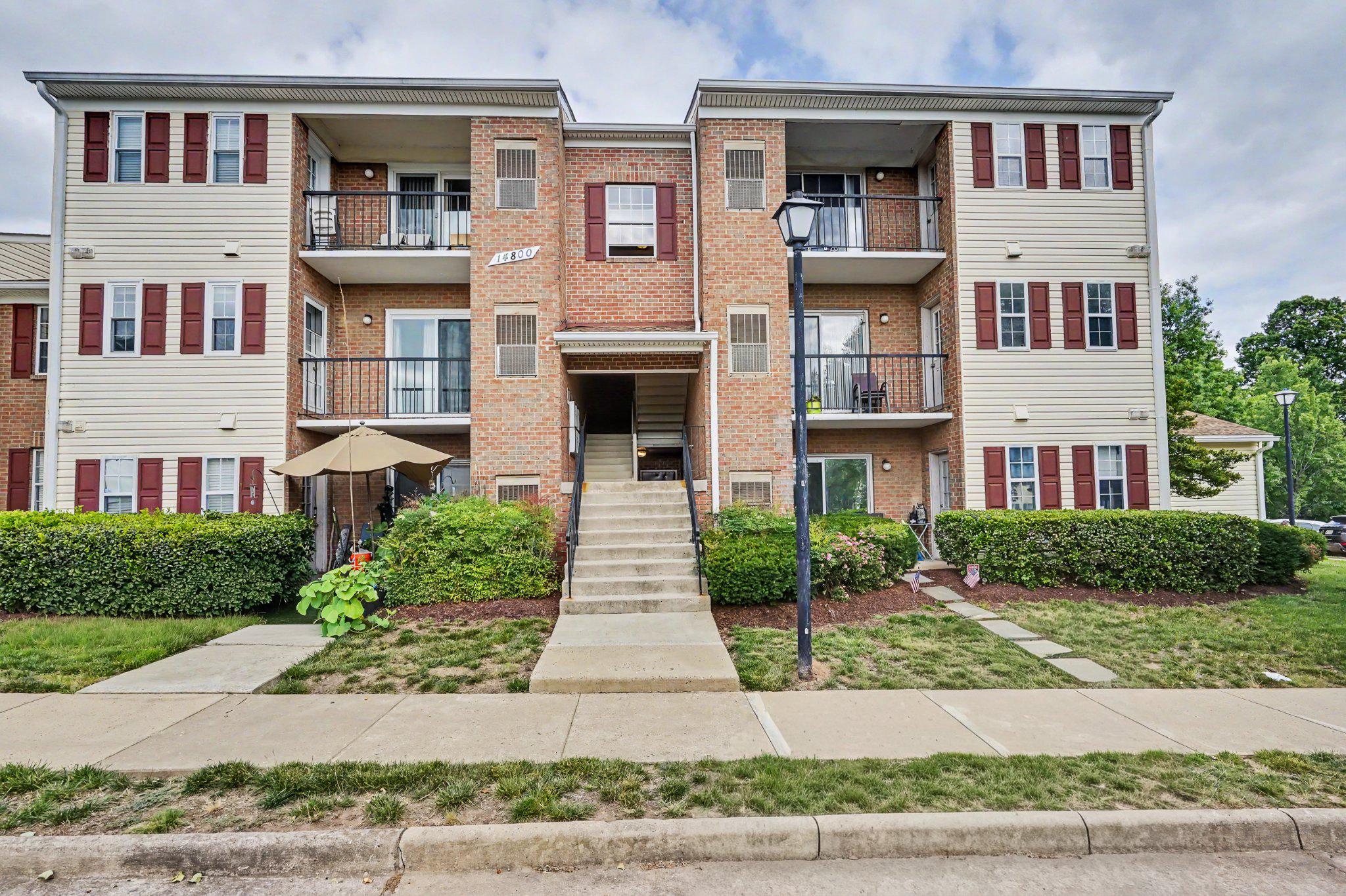 14800 Rydell Road, Unit 201 Centreville, VA 20121 - Photo 26 of 28 Charming brick condo complex exterior.