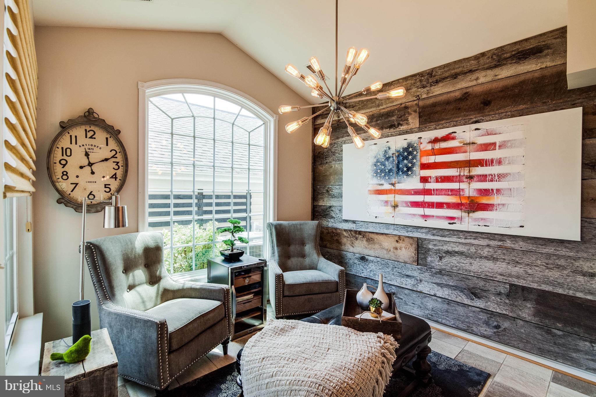 22960 Fanshaw Square Ashburn, VA 20148 - Photo 12 of 30 a living room with furniture and a large window