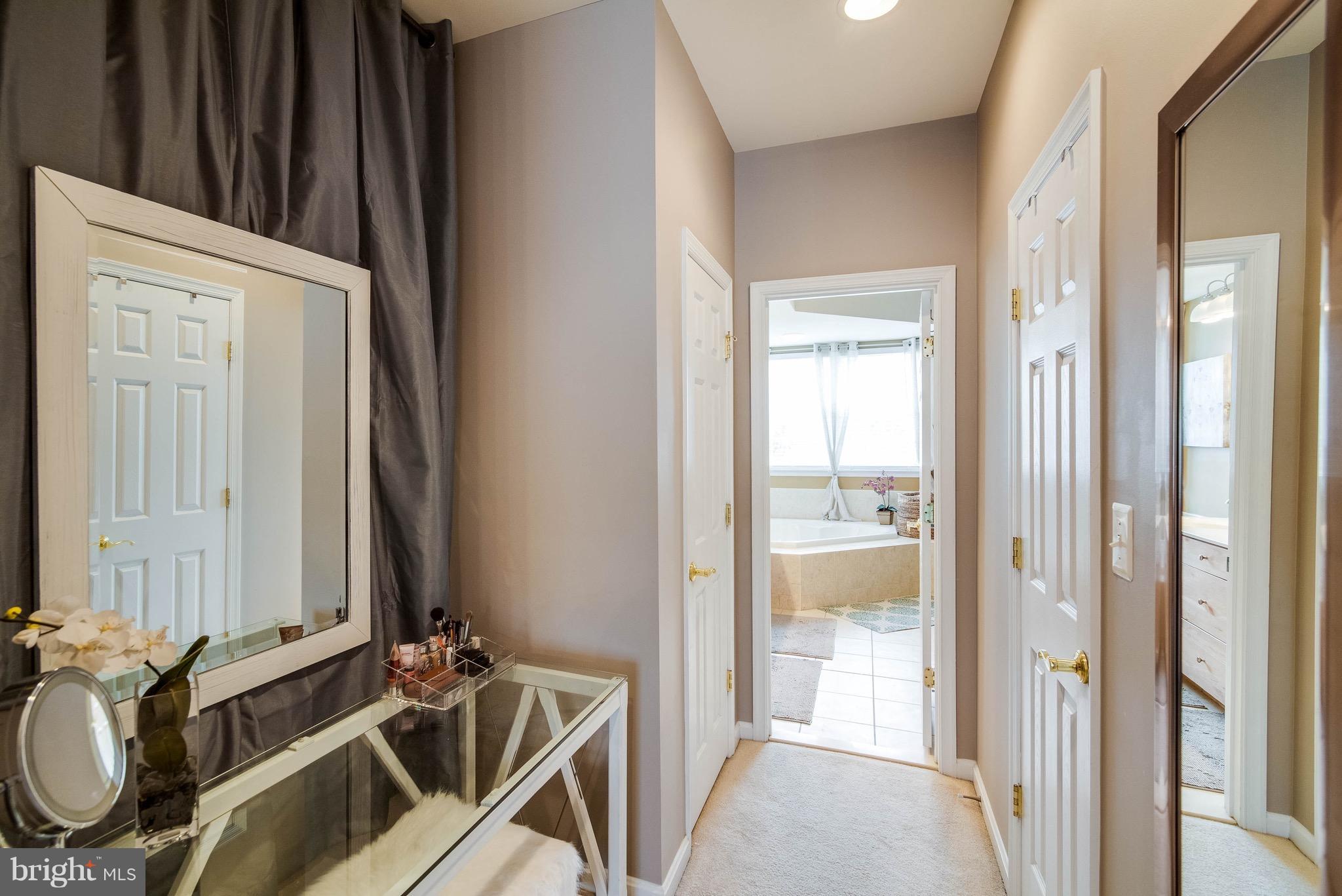 22960 Fanshaw Square Ashburn, VA 20148 - Photo 19 of 30 a bathroom with a sink and a mirror