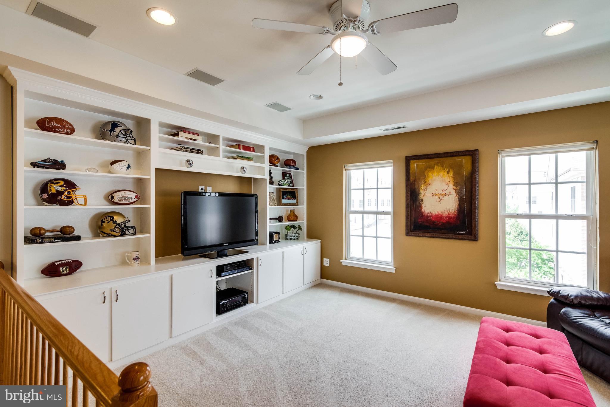 22960 Fanshaw Square Ashburn, VA 20148 - Photo 29 of 30 a bedroom with furniture and flat screen tv