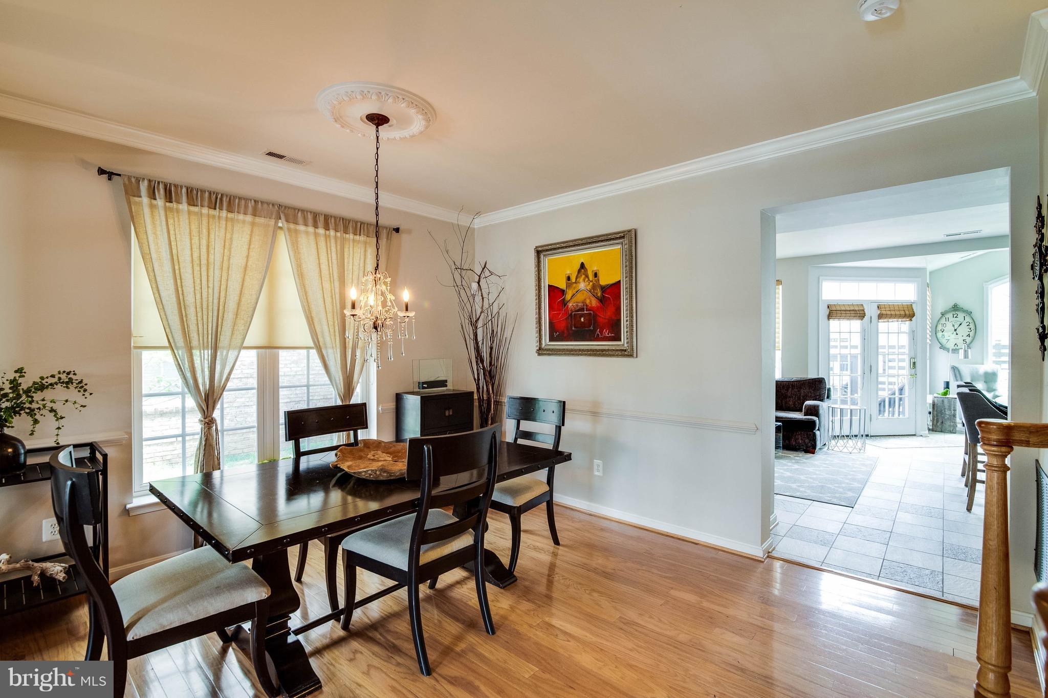 22960 Fanshaw Square Ashburn, VA 20148 - Photo 4 of 30 a dining room with furniture and window